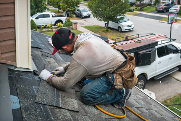 Professional Roofing technician working in Old Bethpage, NY